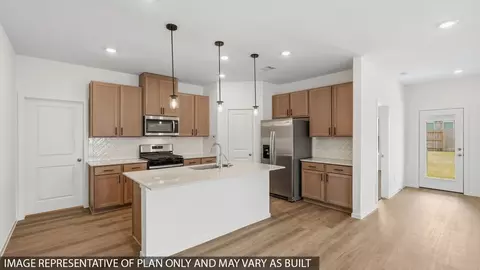 Kitchen - 633 Bronze Wolf Ct, Conroe, TX 77303 photo 2 of 4