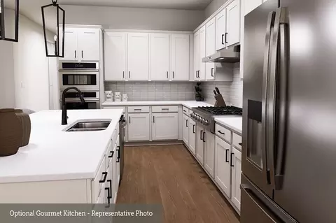 Kitchen - 210 Painters Ridge Ct, Willis, TX 77318 photo 3 of 5