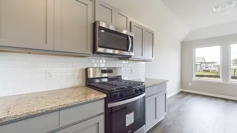 Kitchen - 215 Eagle Heights Dr, Duson, LA 70529 photo 2 of 6