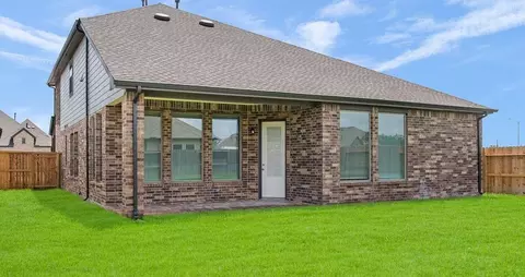 Exterior - 202 Painters Ridge Ct, Willis, TX 77318 photo 2 of 5