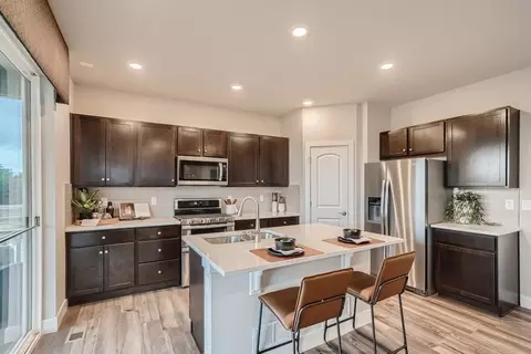 Kitchen - 582 Crestone St, Johnstown, CO 80534 photo 5 of 8
