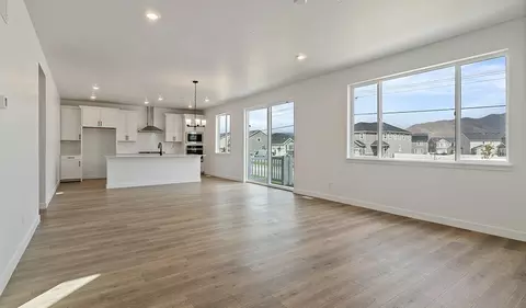 Living - 5394 N Saddle Stone Dr, Eagle Mountain, UT 84005 photo 4 of 7