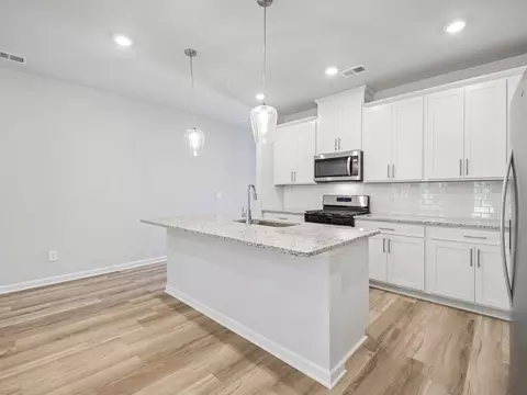 Kitchen - 5520 Cosimo Rd, Fairburn, GA 30213 photo 2 of 5