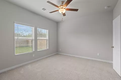 Bedroom - 12076 Moonlight Path Dr, Conroe, TX 77304 photo 3 of 11