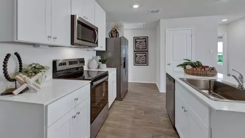 Kitchen - 302 Windflower Cv, Luling, TX 78648 photo 5 of 6