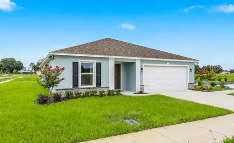 Exterior - 8765 Pine Bark Way, Wildwood, FL 34785 photo 2 of 9