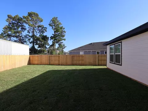 Exterior - 989 Garden Path Dr, Willis, TX 77378 photo 5 of 9