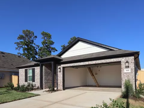 Exterior - 989 Garden Path Dr, Willis, TX 77378 photo 2 of 9