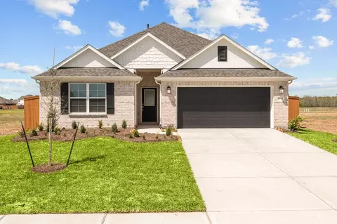 Exterior - 989 Garden Path Dr, Willis, TX 77378 photo 1 of 6