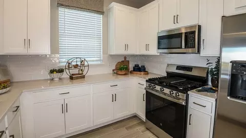 Kitchen - 23076 Silver Pearl Ky, Estero, FL 33928 photo 6 of 7
