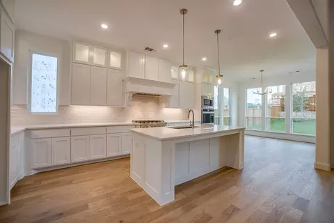 Kitchen - 910 Shooting Star Dr, Prosper, TX 75078 photo 2 of 10