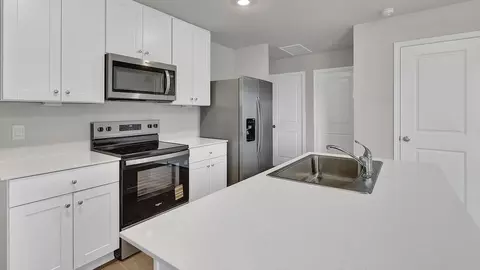 Kitchen - 2207 Gentle Rain Dr, Luling, TX 78648 photo 3 of 10