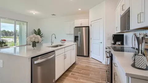 Kitchen - 6510 SE Park Trace Dr, Stuart, FL 34997 photo 1 of 9