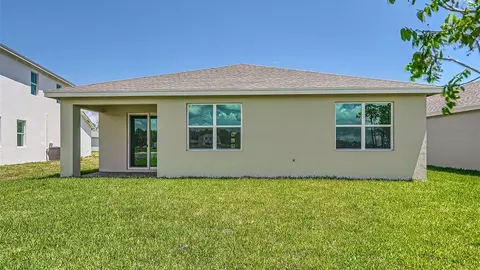 Exterior - 6510 SE Park Trace Dr, Stuart, FL 34997 photo 4 of 10