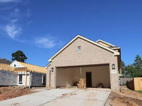 Exterior - 609 Falling Cave Dr, Willis, TX 77378 photo 2 of 7