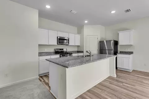 Kitchen - 125 Dionicio Loop, Seguin, TX 78155 photo 3 of 4