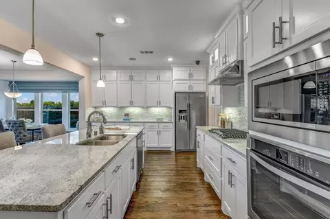Kitchen - 910 Shooting Star Dr, Prosper, TX 75078 photo 4 of 8