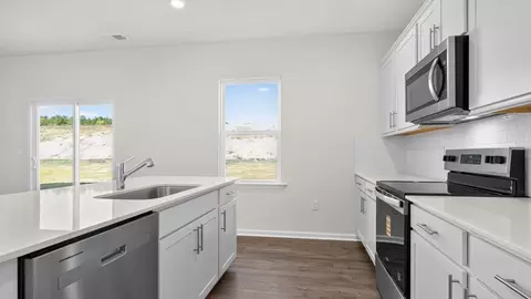 Kitchen - 708 Wilder Bloom Path, Aberdeen, NC 28315 photo 6 of 7