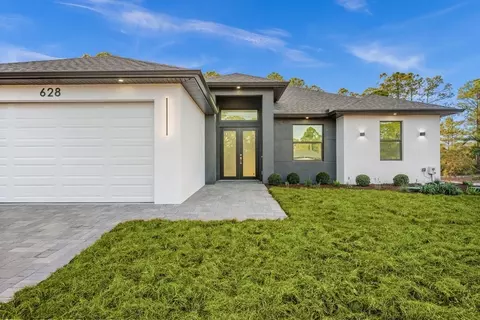 1151 Ermine St E, Lehigh Acres, FL 33974