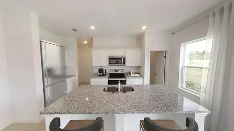 Kitchen - 2562 Adler Ln, Mims, FL 32754 photo 3 of 3