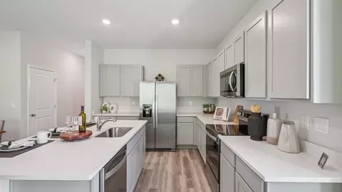Kitchen - 32405 Welling Blade Lp, Wesley Chapel, FL 33545 photo 3 of 3