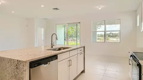 Kitchen - 6510 SE Park Trace Dr, Stuart, FL 34997 photo 2 of 9