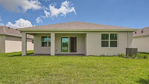 Exterior - 6510 SE Park Trace Dr, Stuart, FL 34997 photo 2 of 8