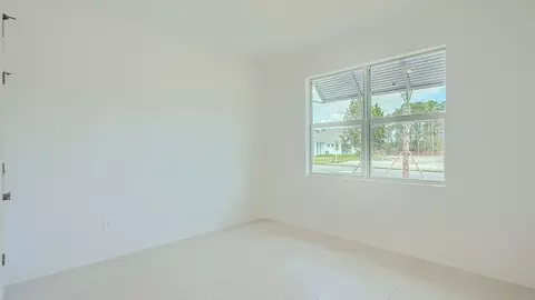 Bedroom - 6510 SE Park Trace Dr, Stuart, FL 34997 photo 3 of 15