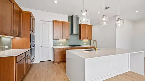 Kitchen - 2321 Bronc Buster Way, Leander, TX 78641 photo 4 of 11