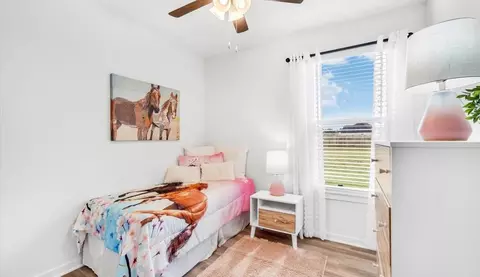 Bedroom - 717 Riggs Ave, Tontitown, AR 72762 photo 2 of 2