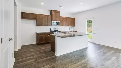 Kitchen - 107 Hollow Oak Bnd, Euharlee, GA 30145 photo 15 of 22