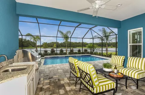 Exterior - 10025 Hammock Brook Dr, Parrish, FL 34219 photo 4 of 16