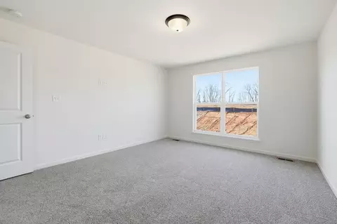 Bedroom - 303 Olympic Dr, Pacific, MO 63069 photo 2 of 7