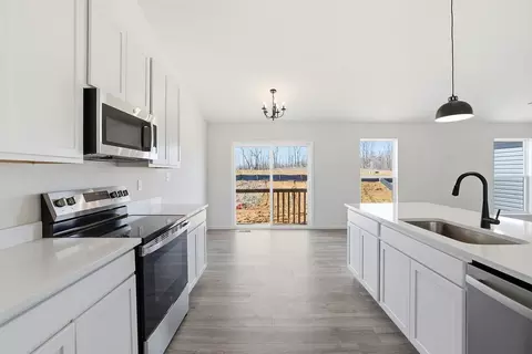 Kitchen - 303 Olympic Dr, Pacific, MO 63069 photo 5 of 5