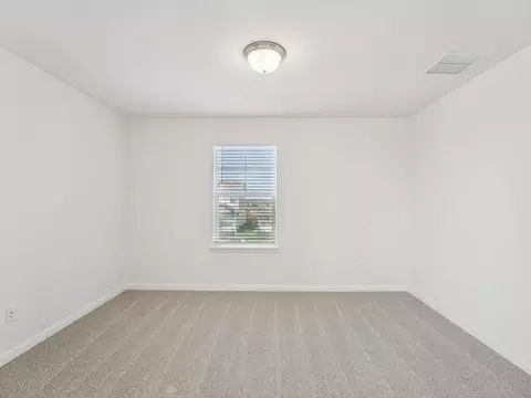 Bedroom - 702 Universal Dr, Hutto, TX 78634 photo 5 of 8