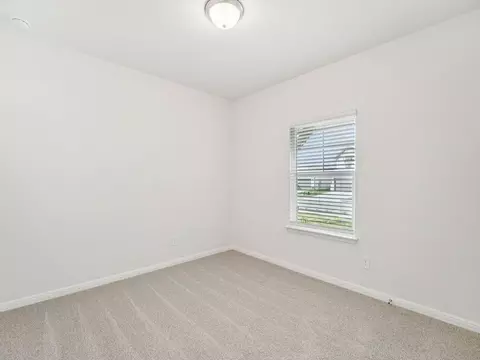 Bedroom - 702 Universal Dr, Hutto, TX 78634 photo 4 of 8