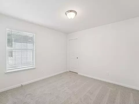 Bedroom - 702 Universal Dr, Hutto, TX 78634 photo 7 of 8