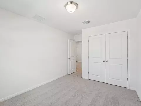 Bedroom - 702 Universal Dr, Hutto, TX 78634 photo 6 of 8