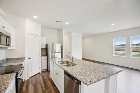 Kitchen - 140 Dionicio Loop, Seguin, TX 78155 photo 3 of 4