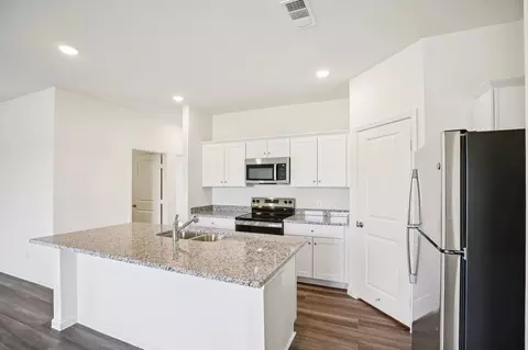 Kitchen - 140 Dionicio Loop, Seguin, TX 78155 photo 4 of 4