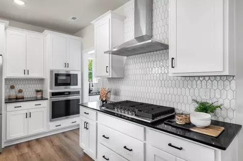 Kitchen - 446-798 Massengill Pond Rd, Willow Spring, NC 27592 photo 6 of 14