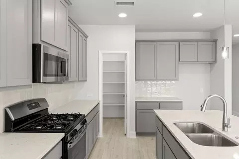 Kitchen - 1101 Trinity Rail Rd, Anna, TX 75409 photo 6 of 8