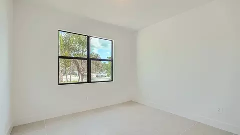 Bedroom - 6510 SE Park Trace Dr, Stuart, FL 34997 photo 4 of 13
