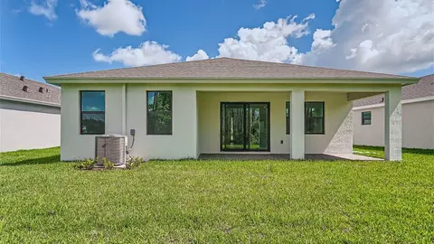 Exterior - 6510 SE Park Trace Dr, Stuart, FL 34997 photo 2 of 8
