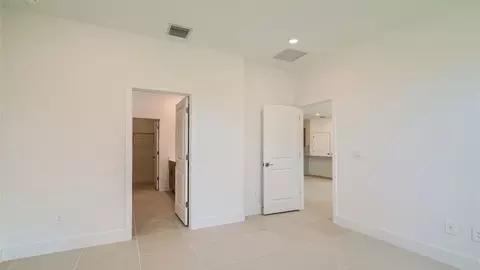 Bedroom - 6510 SE Park Trace Dr, Stuart, FL 34997 photo 2 of 13
