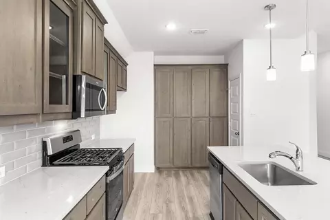 Kitchen - 601 Trinity St, Van Alstyne, TX 75495 photo 3 of 5