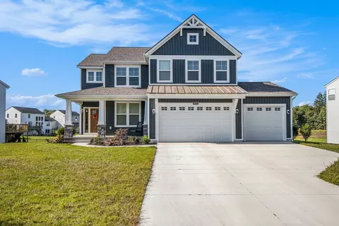 Exterior - 9371 5 Mile NE, Ada, MI 49301 photo 4 of 22