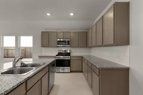 Kitchen - 25812 Jasmine Sprig Ln, Elgin, TX 78621 photo 1 of 2