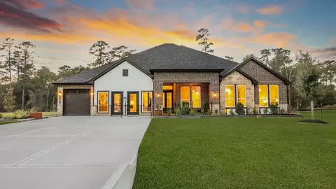 Exterior - 205 Gousoulin Ln, Pinehurst, TX 77362 photo 4 of 8