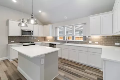 Kitchen - 601 Trinity St, Van Alstyne, TX 75495 photo 5 of 7